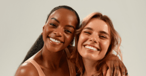 Two women with healthy glowing skin – vitamins and skin health, CliniSculpt Gauteng